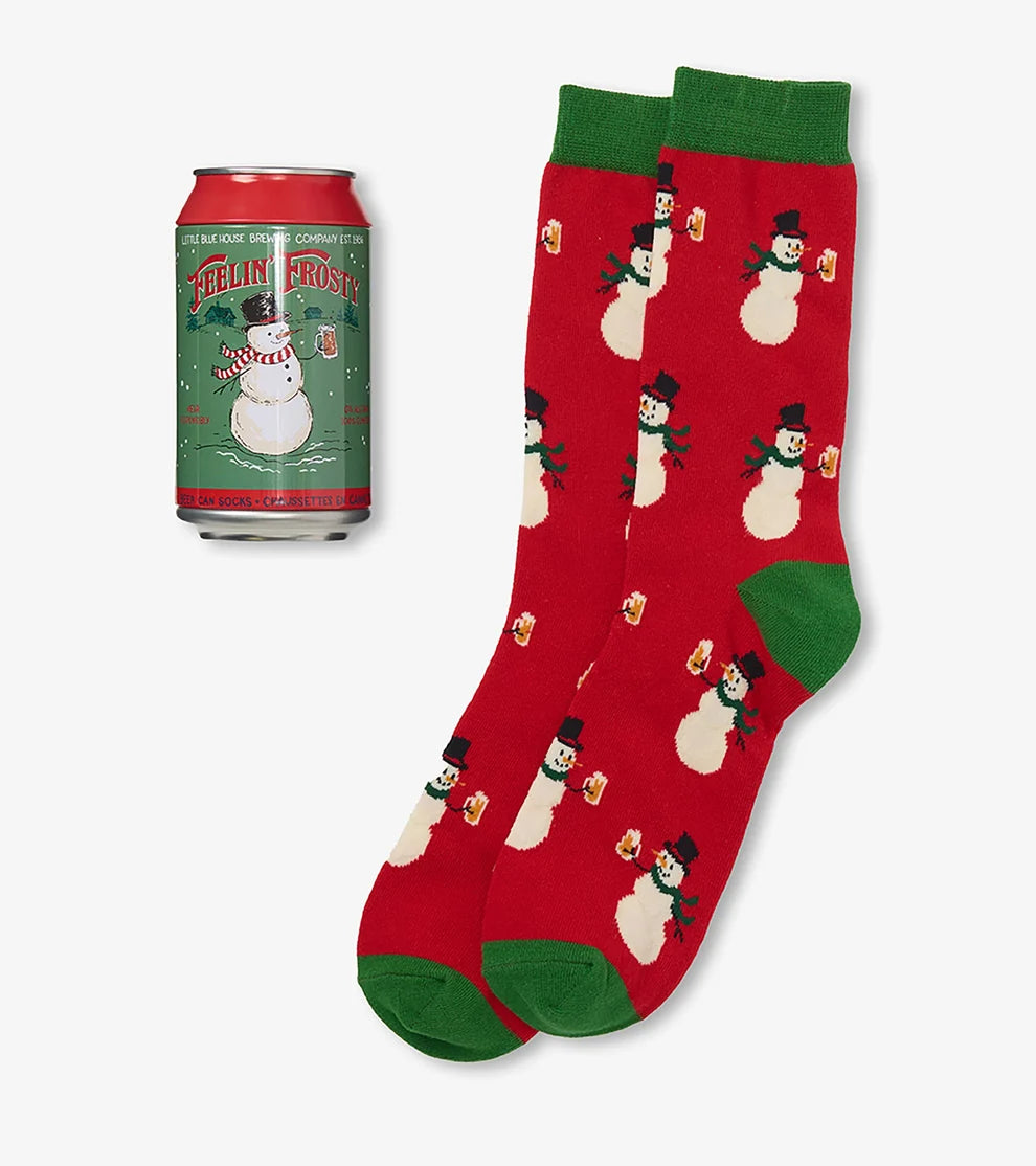 Red socks with snowman pattern and a can of Feltman Brothers beer on a white background