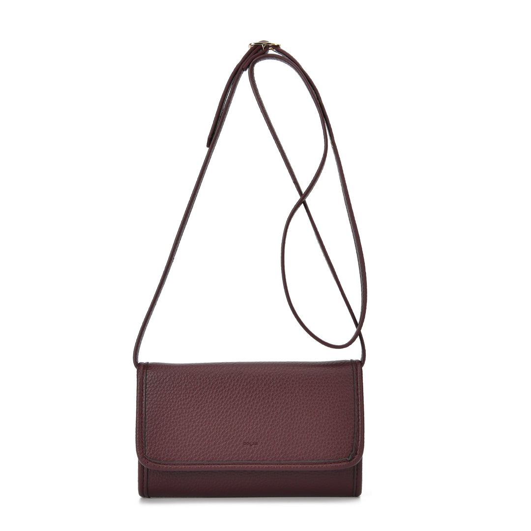 A dark burgundy pebbled leather crossbody bag with a thin matching leather strap, shown against a plain white background.