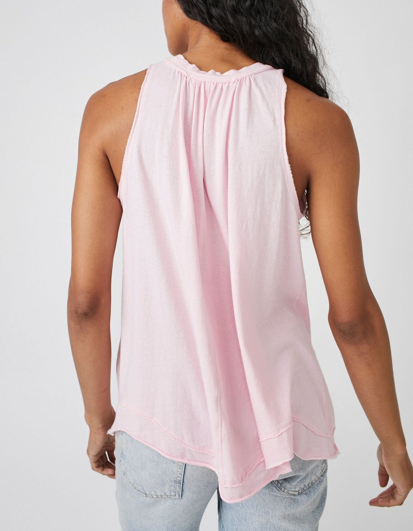 Pleated Tank // Pink Lemon This high-necked Pleated Tank in Pink Lemon is both effortless and essential. Wear it with your laidback look, or layer it up to build an outfit. Its relaxed, slouchy fit features pleating at the bust and dropped armholes, while subtle distressing at the hems complete the timeless, lived-in look. Embrace effortless style with this versatile and cool classic tank.   Hand Wash Cold  Measurements for size small Bust: 41 in Length: 28 in  Contents 100% Cotton
