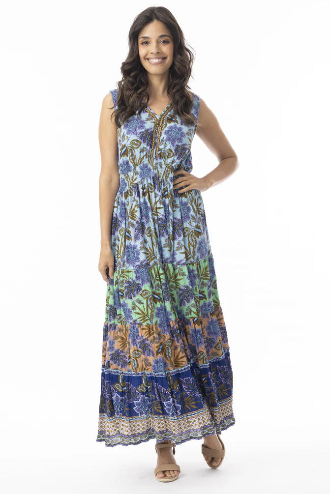 Woman wearing a floral dress on a white background