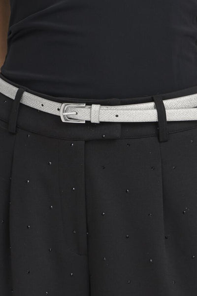 Black dress with a silver belt