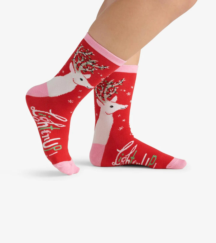 Red socks with reindeer design and &