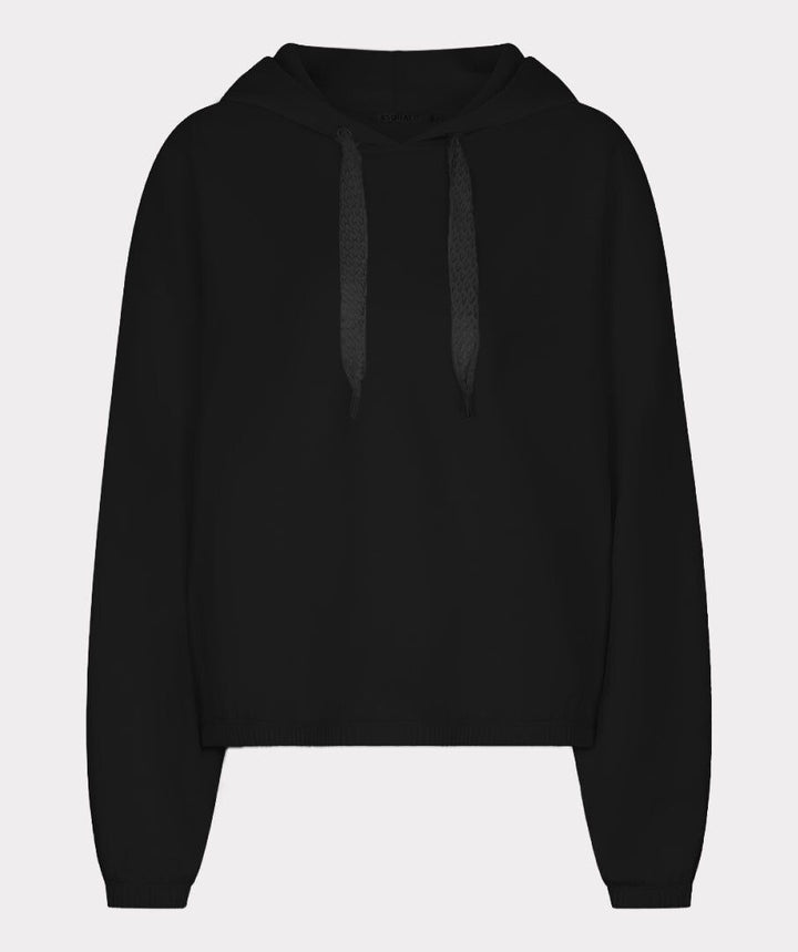 A black cropped hoodie with textured dark gray drawstrings, displayed on a neutral light gray background.