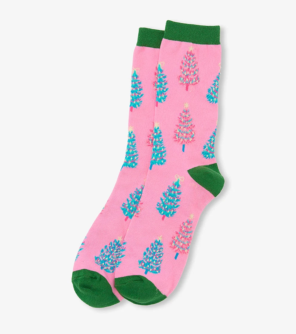 Pink socks with tree pattern and green accents on a white background