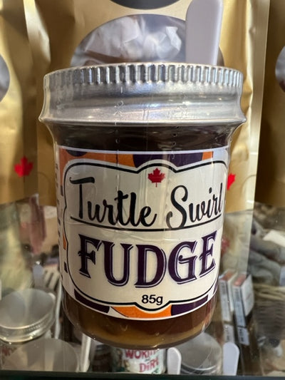 Turtle Swirl Fudge in a Jar with a Spoon