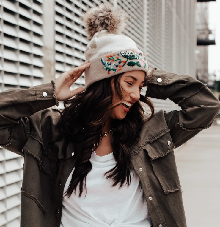 Tan camo knit hat with hand stitched floral pattern